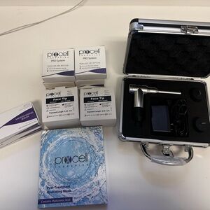 Silver and Black Skincare Device